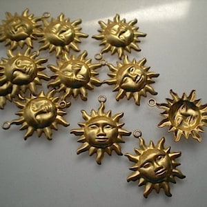 12 small brass sun charms ZB106