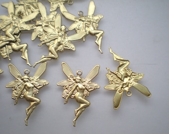 12 small brass fairy charms ZJ369