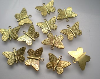 12 kleine koperen vlinderbedels ZF384