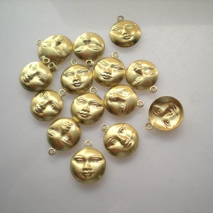18 small brass sun man charms ZB155