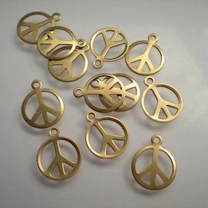 12 small brass peace charms ZJ311