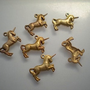 6 brass unicorn charms ZE253