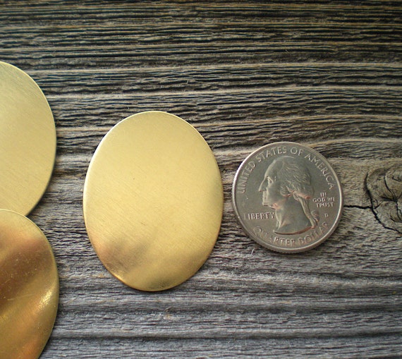 12 extra large flat brass oval discs/stamping blanks 