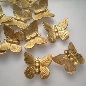 12 small brass butterfly WITH RING charms ZF306