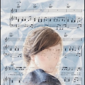 May include: A musical score titled "Make You Feel My Love" with musical notation and a blurred image of a person's face. The background has a light blue, crumpled paper texture.