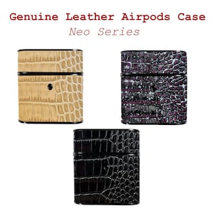 May include: Three genuine leather Airpods cases in tan, purple, and black, each with a crocodile skin texture and black trim. The text "Genuine Leather Airpods Case Neo Series" is displayed above the cases.