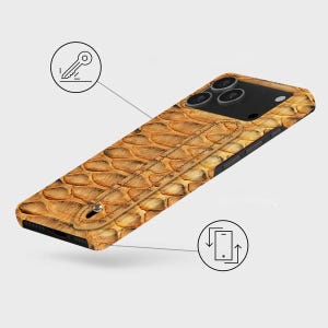May include: A phone case featuring a snakeskin design in brown and tan hues. It includes a hand strap and a black camera module. The design incorporates a key icon and a phone icon with arrows.