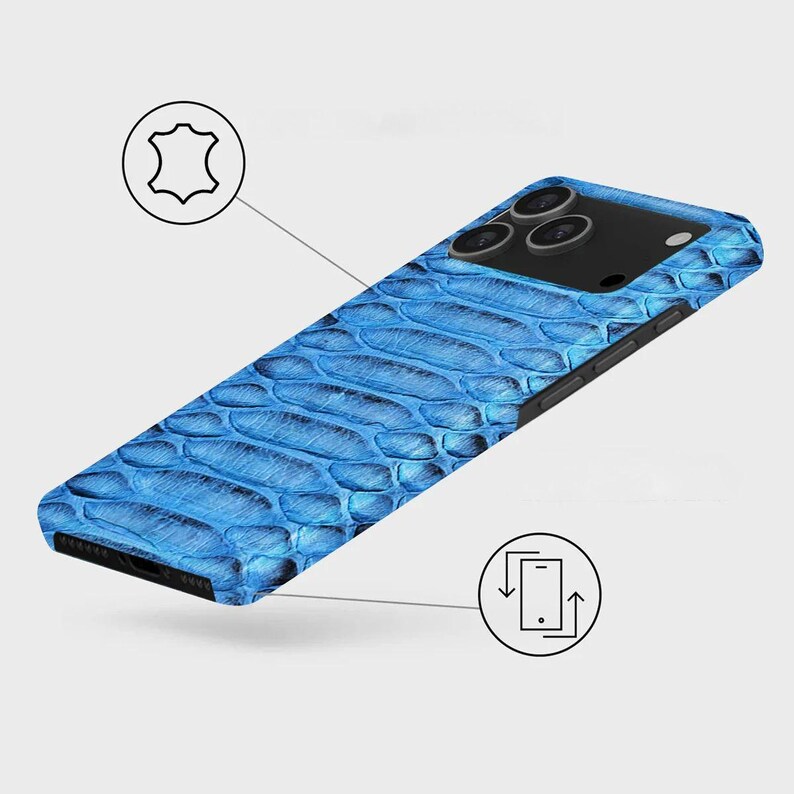 May include: A blue phone case with a snakeskin texture. The case has a black camera module and a black border. The case is made of leather. The image also includes a diagram of a phone and a leather icon.