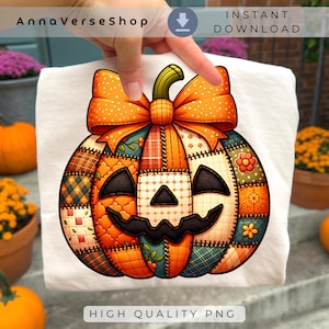 May include: A white t-shirt featuring a colorful, patchwork-style pumpkin design with a large orange bow. The pumpkin has a jack-o'-lantern face and is made of various patterned fabrics. The text "AnnaVerseShop" and "Instant Download" are visible.
