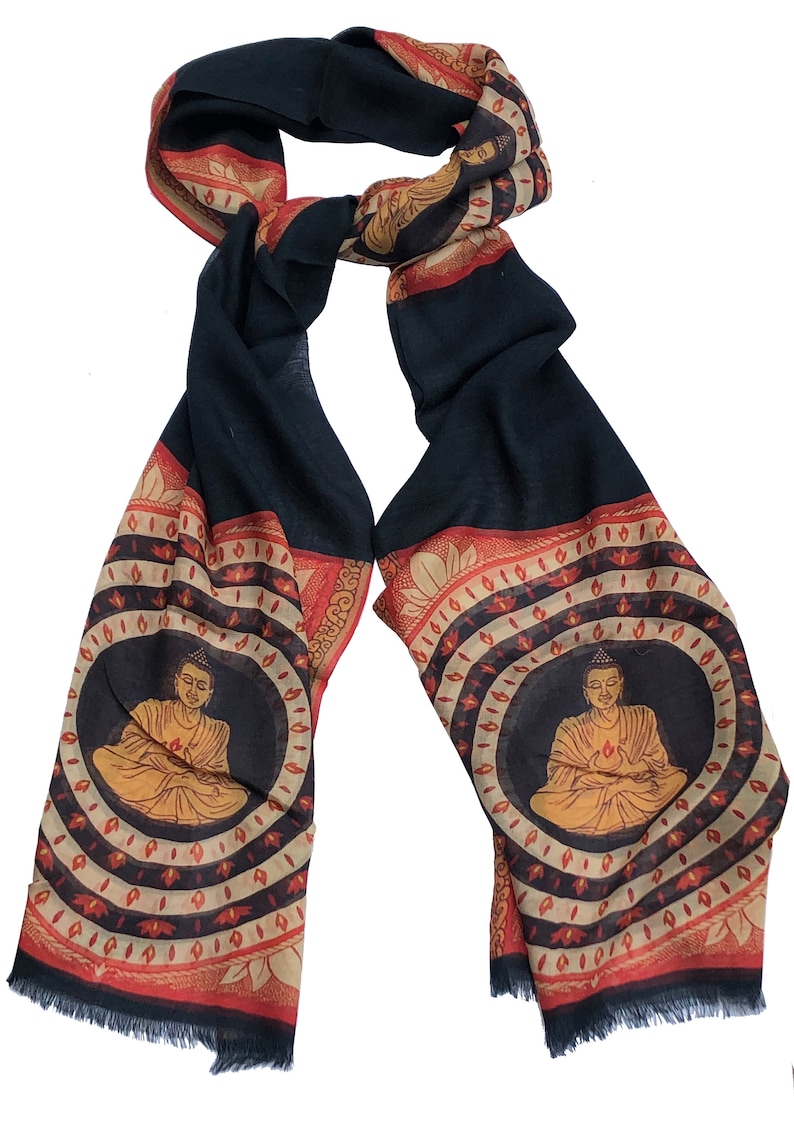 May include: Black silk scarf with a red and gold border featuring a repeating pattern of a seated Buddha figure in a circle.