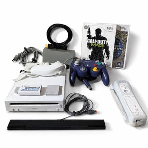 May include: A white Wii game console bundle including a purple GameCube-style controller, a white Wii remote, a black sensor bar, power and AV cables, a Wii to HDMI converter, and two game cases, one titled Call of Duty Modern Warfare 3.