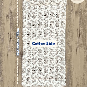 May include: A rectangular cotton item with a floral pattern in brown and white. It measures 29.5 inches (75cm) long, 13.8 inches (35cm) wide, and 0.8 inches (2cm) thick. The text "Cotton Side" is visible.