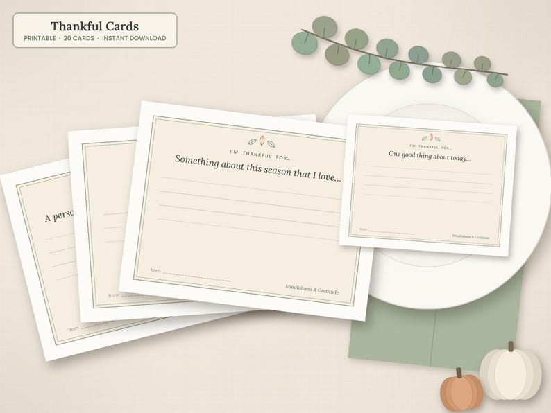 May include: A set of cream-colored Thankful Cards with dark brown text and thin borders. The cards feature prompts like 'Something about this season that I love' and 'One good thing about today' with lines for writing, plus the text 'Mindfulness & Gratitude'.