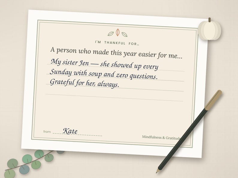 May include: A rectangular gratitude journal page with a cream background and a thin border. The text reads: I'M THANKFUL FOR... A person who made this year easier for me... My sister Jen &mdash; she showed up every Sunday with soup and zero questions. Grateful for her, always. from Kate. Mindfulness & Gratitude.