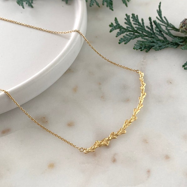 Conifer leaf cypress twig bib necklace in 24 carat gold vermeil on recycled sterling silver