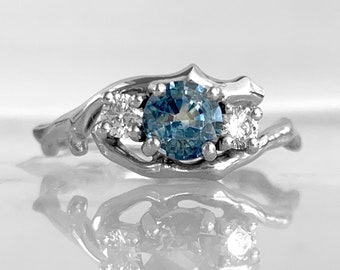 Montana Sapphire Three Stone Ring with Canadamark Diamonds