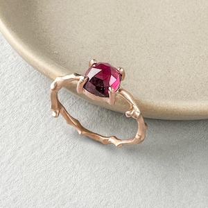Cherry Twig Stacking Ring in solid 9 carat rose gold with square cushion cut rhodolite garnet