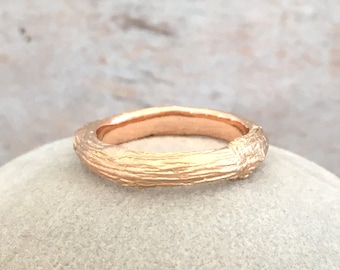 9 carat gold twig wedding ring for men with woodgrain texture