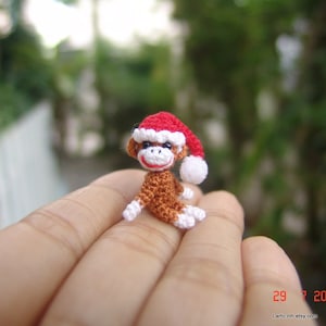 1 inch miniature Christmas sock monkey, tiny amigurumi crochet animal, adorable tiny things, dollhouse miniatures artisan, doll house decor image 1