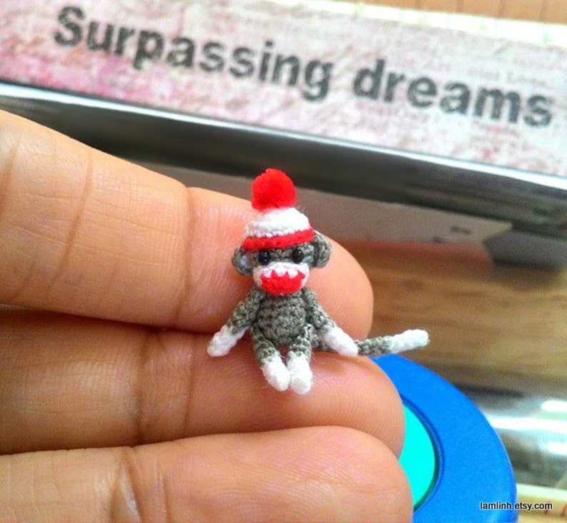 3/4 inch Christmas gray sock monkey, tiny amigurumi crochet animal, doll house miniatures accessories, adorable tiny things, crochet art image 1