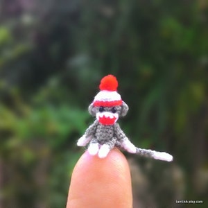 3/4 inch Christmas gray sock monkey, tiny amigurumi crochet animal, doll house miniatures accessories, adorable tiny things, crochet art image 2