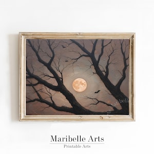 May include: A framed print of a spooky night scene. The artwork depicts a full moon, silhouetted tree branches, and bats against a dark, moody sky. The text "Maribelle Arts Printable Arts" is at the bottom.