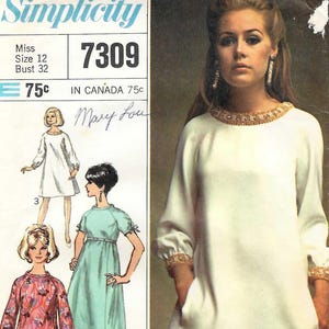 May include: A Simplicity 7309 sewing pattern envelope featuring a white long-sleeved dress with a beaded neckline and cuffs. The cover displays illustrations of three dress variations, including a patterned version and a short-sleeved light blue dress.