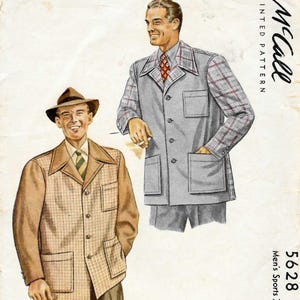 May include: Vintage McCall sewing pattern for a men's sports jacket, with two illustrations of the jacket in different colour schemes. The pattern includes the number 5628 and size information. The jacket has large pockets and a classic collar.