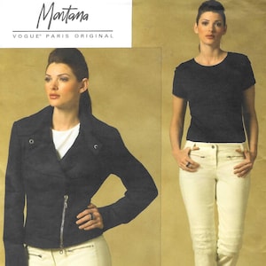 May include: A sewing pattern showing a woman in a black jacket and cream trousers. The jacket has a zip and the pattern includes the text "Montana" and "VOGUE PARIS ORIGINAL". The pattern number is V2973.