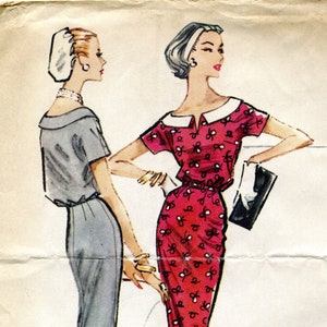May include: A vintage McCall's sewing pattern for a dress, featuring two women wearing different styles. The dress on the left is a simple grey skirt and top, while the dress on the right is a red dress with a white collar and a bow pattern. The pattern number is 4468, and the size is 14. The text also indicates that the pattern is for a misses' dress and costs 50 pence.
