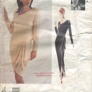 May include: A sewing pattern for a dress with a draped design. The pattern is from Vogue Attitudes and is for sizes 8-10-12. The pattern is for a dress with a draped design. The pattern is from Vogue Attitudes and is for sizes 8-10-12.