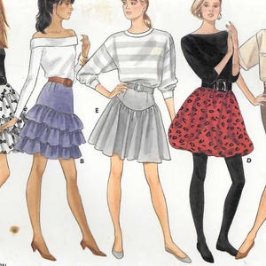 May include: Butterick Classics 5907 sewing pattern featuring five women's fashion designs. The designs include skirts, tops, and dresses. The pattern is rated very easy and includes sizes 6-8-10. The image shows the pattern cover with illustrations of the finished garments.