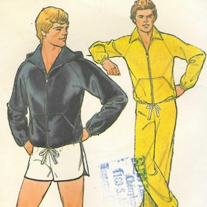 May include: Simplicity 8360 sewing pattern envelope for size medium 38-40. The illustration shows two outfits: a dark blue hooded zip-up jacket with white shorts, and a yellow long-sleeve zip-up jacket with matching yellow sweatpants.
