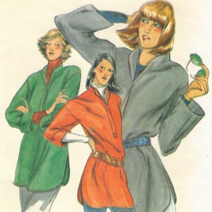 May include: A Butterick sewing pattern envelope, number 6157, size small. The illustration features three figures wearing long-sleeved tunics in green, orange, and grey, paired with dark trousers. The text reads Quick! Butterick 6157.