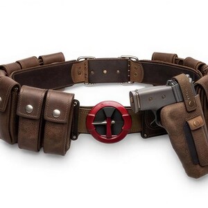 May include: A brown leather utility belt with multiple pouches and a holster for a silver handgun. The belt features a red and black circular buckle. The pouches have silver button closures. The belt is designed for cosplay or costume use.