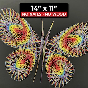 May include: A colorful string art butterfly with dimensions of 14" x 11". The artwork features a vibrant rainbow of colors, with the text "NO NAILS • NO WOOD" in a black rectangle above the butterfly.