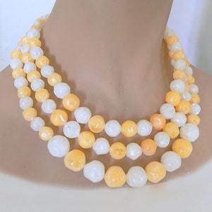 1950s-60s Mrs. Maisel three strand necklace of plastic beads with your choice of white glitter or pale coral button clip earrings