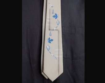 1950s air brushed and hand -painted necktie in grey and blue, with white accents / no label / vintage tag