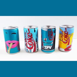 1980s set of four designer Cherry COKE cans from Germany, Near Mint, signed, empty, 2 cans with minor scratch, Barware