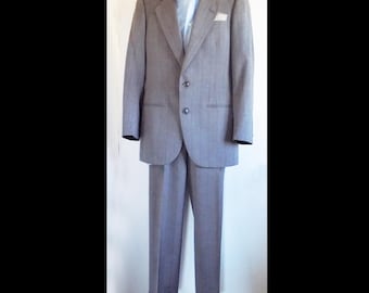 1980-90s Pierre Cardin Mans blue-grey suit with occasional red threads, Made in the U.S.A. 30" waist pants, jacket 38 chest