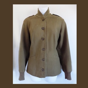 May include: A brown, button-up jacket with a mandarin collar and long sleeves. The jacket has a fitted silhouette and a slightly cropped length.