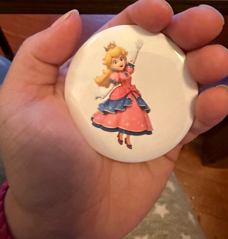 May include: A set of three ceramic mugs with a speckled, matte finish. The mugs are in shades of cream, light gray, and dark gray. Each mug has a simple, minimalist design, perfect for coffee or tea.