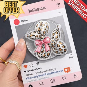 May include: A pink Instagram-themed card featuring a balloon animal with a leopard print design and a pink bow. The card includes the Instagram interface with a heart, comment, and profile icons. The text on the card reads "BEST OFFER" and "NEXTDAY SHIPPING".