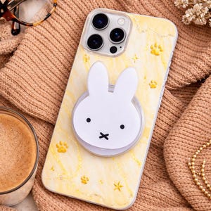 May include: A rustic wooden sign with the text "Welcome to our home" in white lettering. The sign features a distressed finish and a simple, inviting design, perfect for entryway decor.