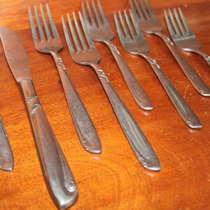 Swirls Vintage Flatware from HULL in Karlstad Pattern Stainless Silverware BIN 12 knives fork spoon