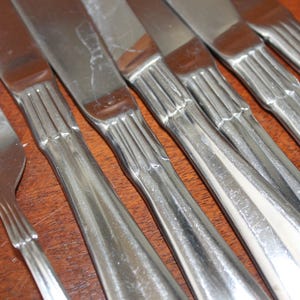 Set di posate in acciaio inox vintage FARBERWARE PETAL coltello cucchiaio posate di ricambio finitura lucida in acciaio inox Mid Century Modern