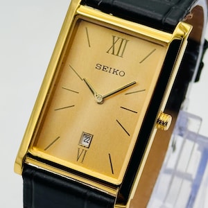 Vintage Seiko slim Watch: Gold Plated, Leather Band, Rectangle Face men&#39;s tank watch