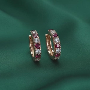 May include: A handmade, wooden cutting board with a natural finish. The board features a live edge and a juice groove. Dimensions are approximately 18 inches long, 12 inches wide, and 1 inch thick.