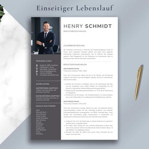 May include: A professional resume template with a photo of a man in a suit. The resume is in black and white with sections for personal information, education, and work experience. A gold pen rests on the right side of the resume.