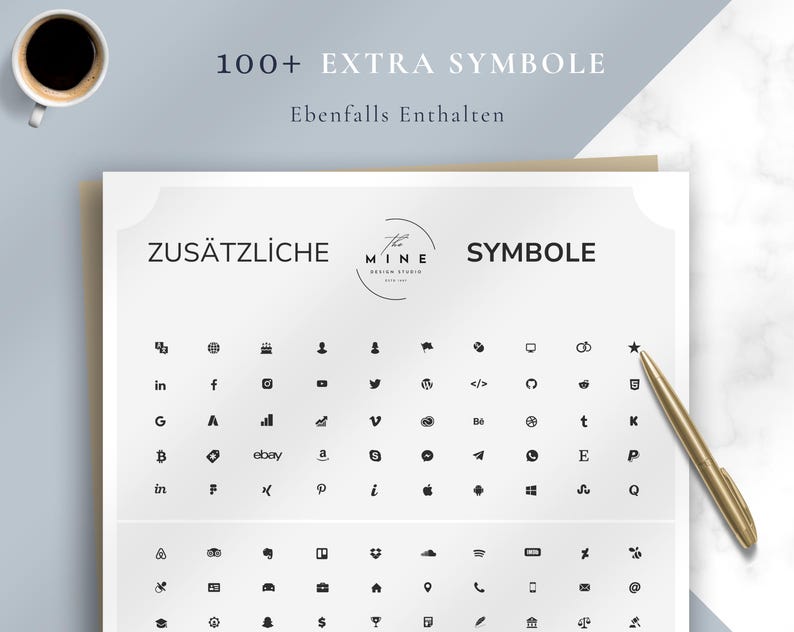Puede incluir: Una hoja blanca con varios iconos negros y el texto "100+ EXTRA SYMBOLE" y "ZUS&Auml;TZLICHE SYMBOLE". Un bol&iacute;grafo dorado descansa sobre la hoja y una taza de caf&eacute; est&aacute; en la esquina superior izquierda.
